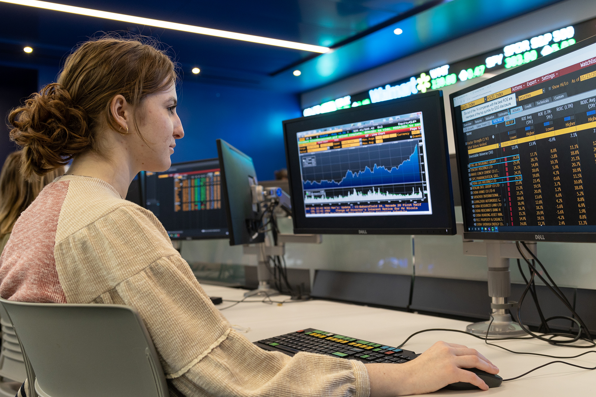 A woman works on a Bloomberg terminal in the APM McCarthy Finance Lab of Capitol Federal Hall